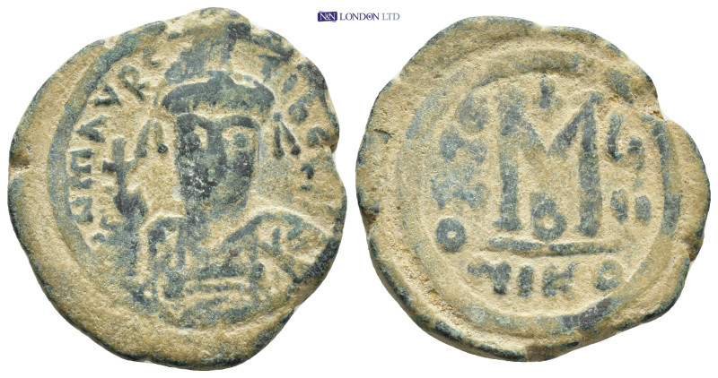 Maurice Tiberius AD 582-602. Nikomedia Follis AE (11.95 Gr. 30mm) 
Helmeted and ...