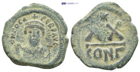 PHOCAS (602-610). Half Follis. Constantinople. (6 Gr. 24mm.)
Crowned bust facing, wearing consular robes and holding mappa and cross. 
Rev: Large XX; ...
