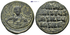 Anonymous (attributed to Basil II). AE Follis, ca. 976-1025. Constantinople. (12.06 Gr. 3omm.)
Bust of Christ Pantokrator facing, raising hand in bene...