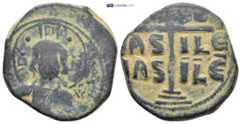 Attributed to Romanus III or Michael IV (1028-1034 or 1034-1041) AE follis (27mm, 13.23 g) Obv: +EMMA - NOVHA / IC - XC; Nimbate bust of Christ facing...