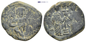 Constantine X Ducas, with Eudocia. 1059-1067. AE Follis (26mm, 7.63 g) Constantinople mint. Christ standing facing on footstool Rev: Constantine and E...