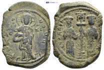 Constantine X Ducas. 1059-1067. Æ Follis (30mm, 12.36 g). Constantinople. +EMMA NOVHA, IC-XC, Christ standing facing on footstool, wearing nimbus and ...