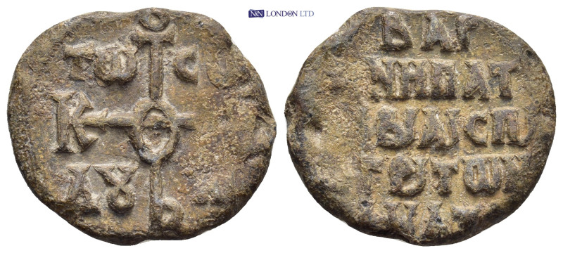 Byzantine Lead Seal (24mm, 9.41 g) Obv: Cruciform monogram Rev: Legends in five ...