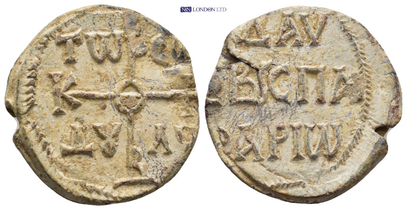 Byzantine Lead Seal (26mm, 9.76 g) Obv: Cruciform monogram Rev: Legends in three...