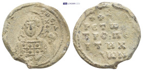 Byzantine Lead Seal (21mm, 5.98 g) Obv: Nimbate facing bust of Saint, holding spear over his right shoulder and resting shield on his left arm. Rev: L...