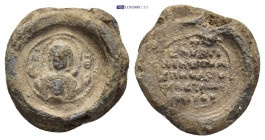 Byzantine Lead Seal (17mm, 4.8 g) Obv: Bust of the Virgin Mary facing, orans, with Christ medallion on breast. Rev: Legends in five lines.