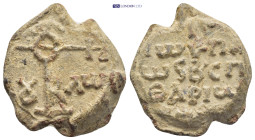 Byzantine Lead Seal (24mm, 18.86 g) Obv: Cruciform monogram. Rev: Legends in three lines.