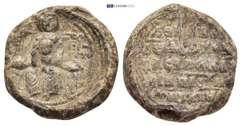 Byzantine Lead Seal (19mm, 9.59 g) Obv: Mary, seated on the throne, holding the ...