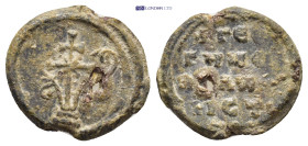 Byzantine Lead Seal (16mm, 3.12 g) Obv: Patriarchal cross on steps with floral ornaments springing from base.. Rev: Legends in five lines .
