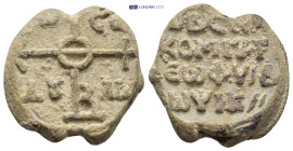 Byzantine Lead Seal (24mm, 17.13 g) Obv: Cruciform monogram. Rev: Legends in four lines.