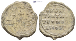 Byzantine Lead Seal (20mm, 7.28 g) Obv: Patriarchal cross set upon three steps; floral scroll to left and right. Rev: Legends in four lines.