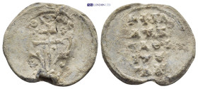 Byzantine Lead Seal (24mm, 5.0 g) Obv: Patriarchal cross set upon three steps; floral scroll to left and right. Rev: Legends in four lines.