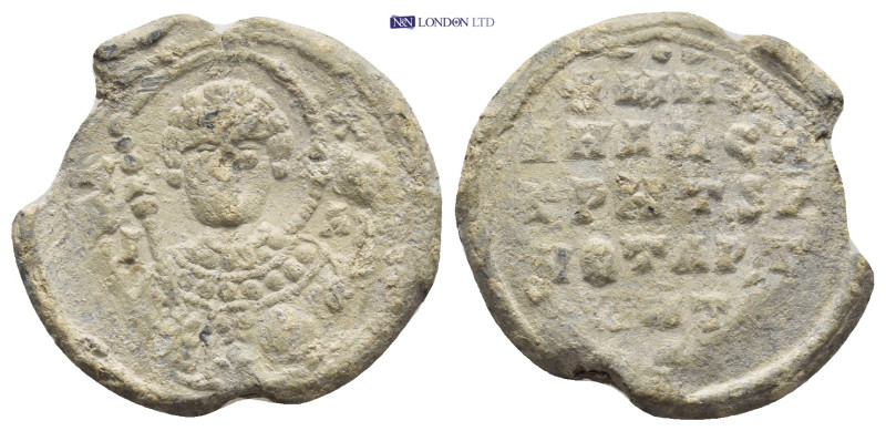 Byzantine Lead Seal (22mm, 7.14 g) Obv: Nimbate facing bust of Saint, holding sp...