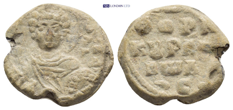 Byzantine Lead Seal (20mm, 7.13 g) Obv: Nimbate facing bust of Saint, holding sp...