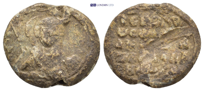 Byzantine Lead Seal (20mm, 6.0 g) Obv: Nimbate facing bust of Saint, holding spe...