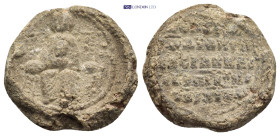 Byzantine Lead Seal (21mm, 9.6 g) Obv: Mary, seated on the throne, holding the child Jesus in her arms. Rev: Legends in five lines.