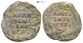 Byzantine Lead Seal (25mm, 19.45 g) Obv: Legends in four lines. Rev: Legends in four lines.