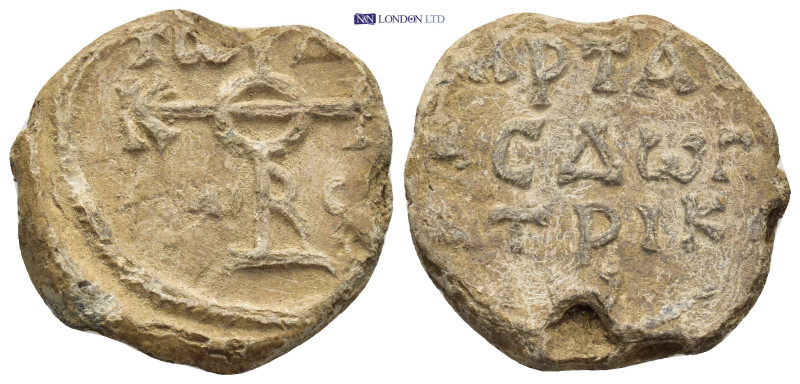 Byzantine Lead Seal (25mm, 12.23 g) Obv: Cruciform monogram. Rev: Legends in thr...