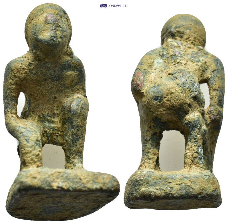 Bronze statuette. A male figure kneeling. (38mm, 36.4 g)
