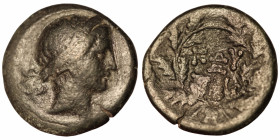 Mysia. Kyzikos. (around 50 BC). Bronze Æ. (18mm, 4,24g). Obv: head of Kore right. Rev: monogram in wreath.