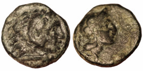 Mysia. Pergamon. (around 300 BC) Bronze Æ. (9mm 1,02g) Obv: helmeted head of Athena right. Rev: haed of Herakles right.