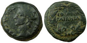 Caligula. (37-41 AD) Bronze Æ. (24mm, 8,28g) provincial mint. Obv: draped bust of Caligula left. Rev: legend in wreath.