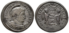 Constantine I (AD 307/310-337).
Follis
(AE, 18 mm, 3.81 g)
AD 319, Treveri.

IMP CONSTANTINVS MAX AVG Bust of Constantine I right, helmeted and c...