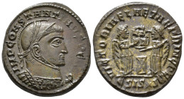 Constantine I (AD 307/310-337).
Follis
(AE, 18 mm, 3.12 g)
AD 318, Siscia.

IMP CONSTANTINVS P F AVG Bust of Constantine I right, helmeted and cu...