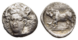 SICILY. Abakainon. Litra (circa 410-390 BC).

Obv: Head of nymph facing slightly left.
Rev: ABA.
Boar standing left; below piglet and double exergual ...