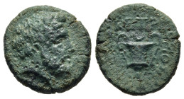 KINGS OF THRACE (Odrysians). Ketriporis (circa 356-352/1 BC). Ae.

Obv: Head of Dionysus right, wearing ivy wreath.
Rev: KETPI / ΠOPIOΣ.
Kantharos; th...