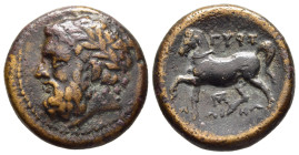 THESSALY. Gyrton. AE Trichalkon (Late 4th-early 3rd centuries BC).

Obv: Laureate head of Zeus left.
Rev: ΓΥΡΤΩ/ΝΙΩΝ.
Horse prancing left; monogram be...