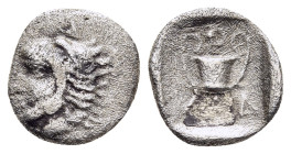 AKARNANIA. Alyzeia. Obol or Diobol (circa 420-380 BC).

Obv: Bearded head of Herakles in lion skin headdress left.
Rev: ΔΙΟ (counterclockwise) around ...