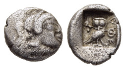 ATTICA. Athens. Tritartemorion (circa 500/490-485/480 BC).

Obv: Helmeted archaic head of Athena right.
Rev: AΘΕ.
Owl standing right, head facing; oli...