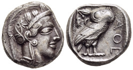 ATTICA. Athens. Tetradrachm (circa 454-404 BC).

Obv: Helmeted head of Athena right, with frontal eye.
Rev: AΘE.
Owl standing right, head facing; oliv...