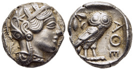 ATTICA. Athens. Tetradrachm (circa 454-404 BC).

Obv: Helmeted head of Athena right, with frontal eye.
Rev: AΘE.
Owl standing right, head facing; oliv...
