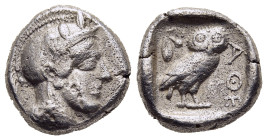 ATTICA. Athens. Drachm (circa 454-404 BC).

Obv: Helmeted head of Athena right.
Rev: AΘE.
Owl standing right, head facing; olive sprig to left; all wi...