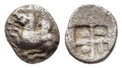 CORINTHIA. Corinth. Hemiobol (circa 550-515 BC).

Obv: Q; Pegasos flying left. 
Rev: Quadripartite incuse square with swastika pattern. 

BCD Corinth ...