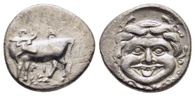 MYSIA. Parion. Hemidrachm (4th century BC).

Obv: ΠΑ / ΡΙ.
Bull, with head right, standing left on ground line. Control: branch below.
Rev: Facing gor...