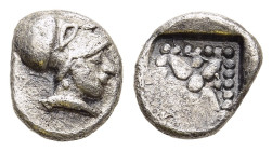 TROAS. Kolone. Hemiobol (5th century BC).

Obv: Head of Athena to right, wearing Corinthian helmet. 
Rev: Stellate pattern within pelleted square bord...