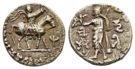INDO-SKYTHIANS. Azes. Drachm (Circa 58-12 BC).

Obv: Azes right on horseback, holding spear; Kharosthi letter to right.
Rev: Zeus standing left, holdi...