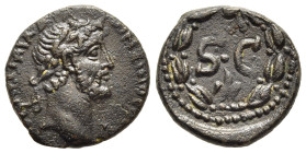 SELEUCIS & PIERIA. Antioch. Antoninus Pius (138-161). AE.

Obv: Laureate head right.
Rev: Large SC within wreath; eagle standing right; numeral letter...