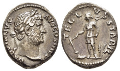 HADRIAN (117-138). Denarius. Rome.

Obv: HADRIANVS AVG COS III P P.
Laureate head right.
Rev: TELLVS STABIL.
Tellus standing left, holding plow and ra...