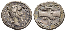 ANTONINUS PIUS (138-161). Denarius. Rome.

Obv: ANTONINVS AVG PIVS P P.
Laureate head right.
Rev: COS IIII.
Clasped hands over caduceus and grain ears...