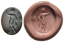 ROMAN IMPERIAL. A nicely engraved bloodstone (jasper) ring bezel (ca. 3rd century AD).

Obv: Sol standing left, holding whip and raising right hand.

...