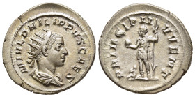PHILIP II (Caesar, 244-247). Antoninianus. Rome.

Obv: M IVL PHILIPPVS CAES.
Radiate and draped bust right.
Rev: PRINCIPI IVVENT.
Philip standing left...