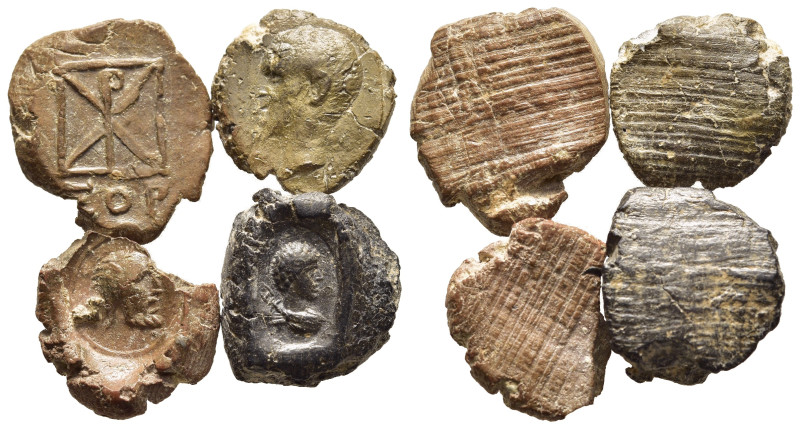 ROMAN EMPIRE. Lot of four Teracotta Seals. Late 2nd-3rd century.

Condition: Abo...