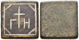 BYZANTINE EMPIRE. Commercial weight (5h- 7th century AD). Uncertain standard.

A square bronze weight. The top bears the a cross flanked by the letter...