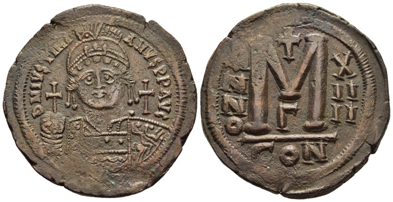 JUSTINIAN I (527-565). Ae Follis. Constantinople. Dated RY 14 (540/1).

Obv: Hel...