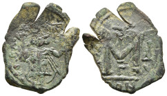 TIBERIUS III (APSIMAR) (698-705). Follis. Constantinople. Dated RY 4 (701/2).

Obv: Tiberius standing facing, holding globus cruciger and long cross.
...