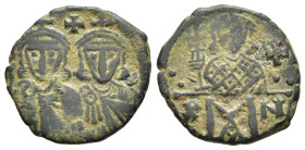 CONSTANTINE V COPRONYMUS with LEO IV and LEO III (741-775). Follis. Constantinople.

Obv: Crowned and draped facing busts of Constantine V and Leo IV;...